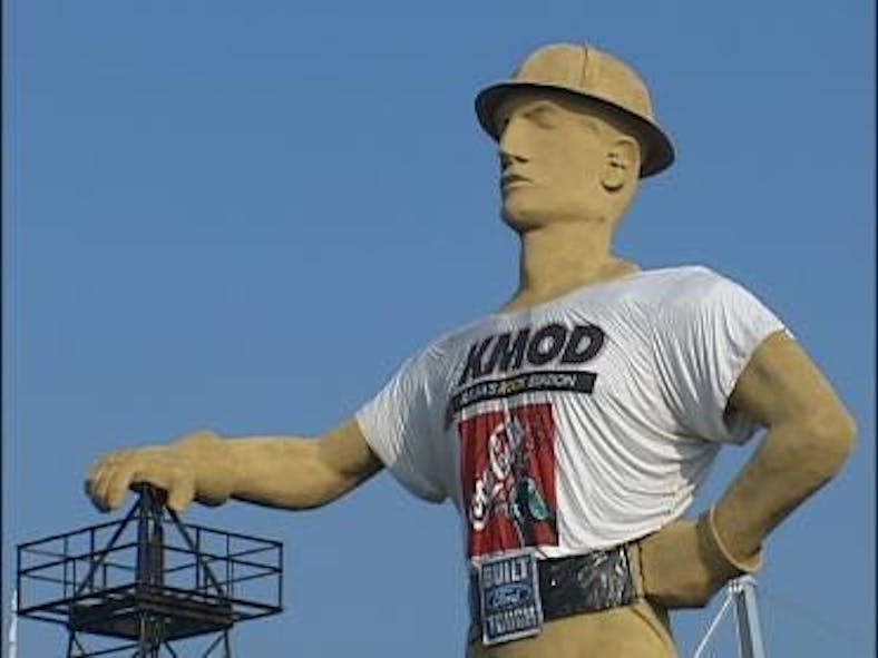 The Golden Driller Gets Dressed