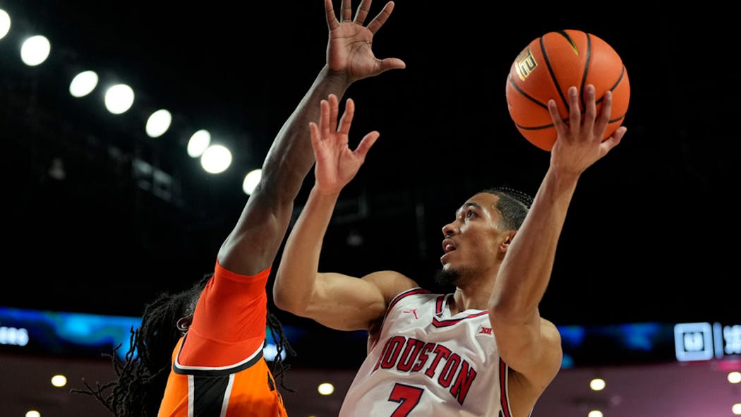 Houston Milos Uzan defended by Oklahoma State Jamyron Keller