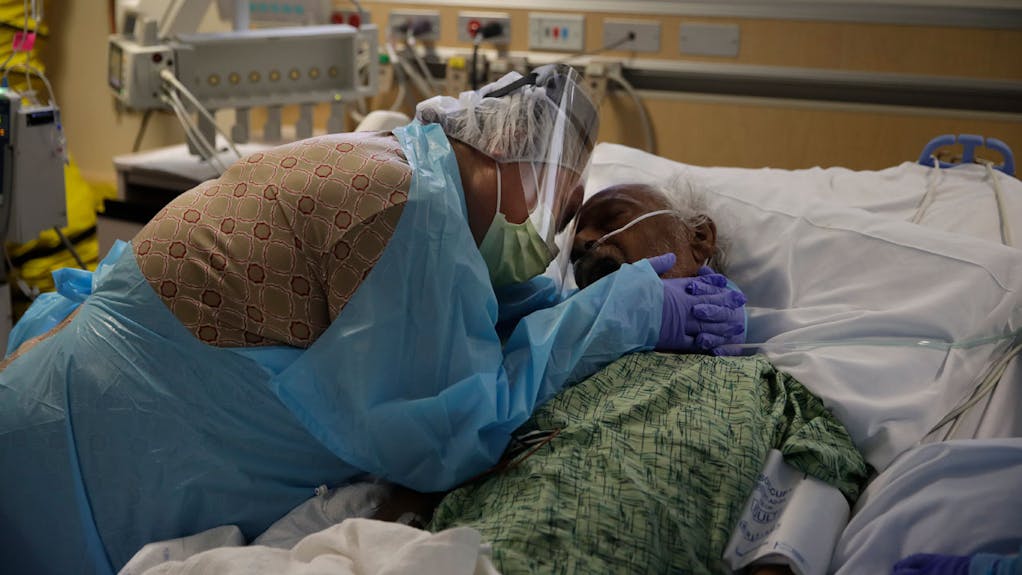 US COVID-19 Deaths Top 300,000 Just As Vaccinations Begin