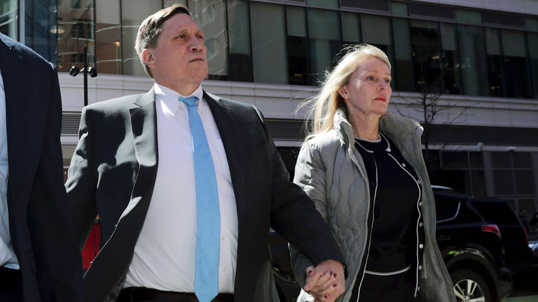 Parents Convicted In College Scam Remain Free During Appeal