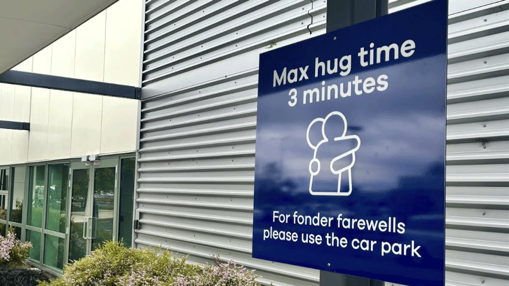 New Zealand airport asking visitors to make farewells faster.