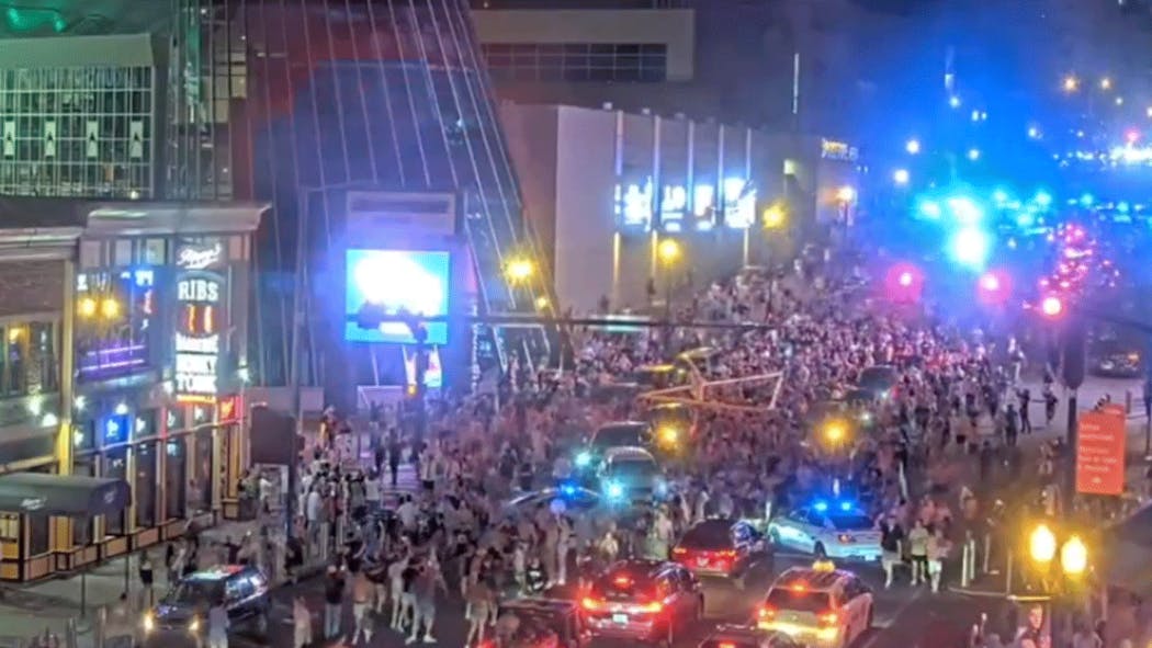 Goalpost from FirstBank Stadium carried through Nashville.