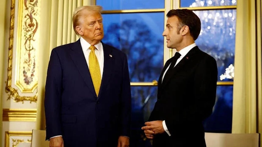 Trump and Macron in Paris, 2024.