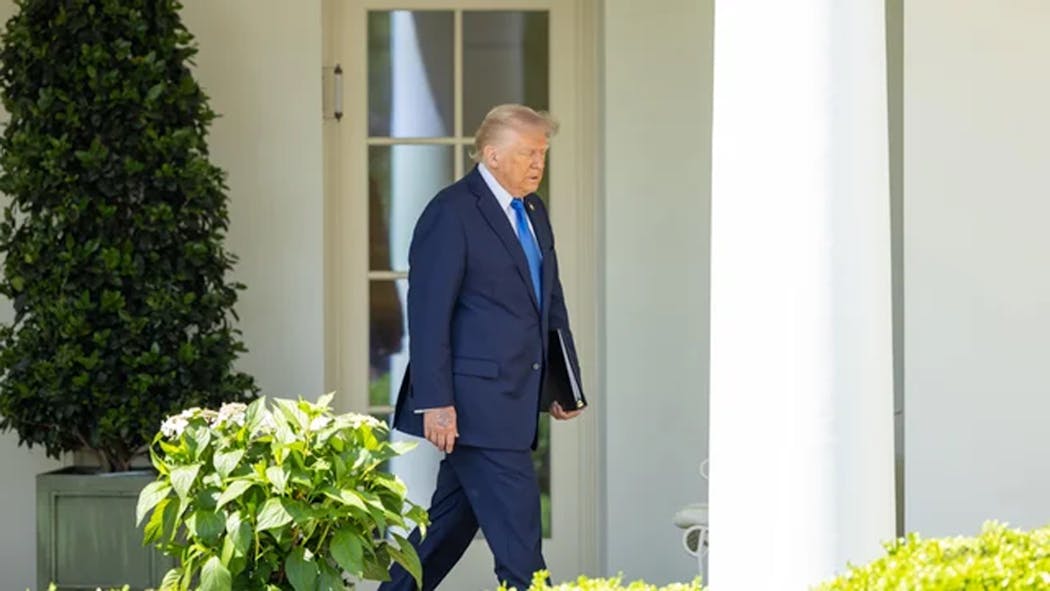 Trump walking outside